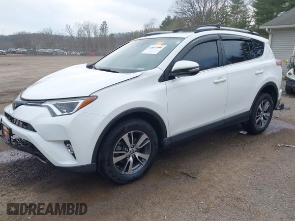 2018 Toyota RAV4 XLE with VIN JTMRFREV9JJ218173, listed as a IAAI auction lot 42037959 with 91,056 mi miles. Bid and sale history available at carsss.com. Image 2.