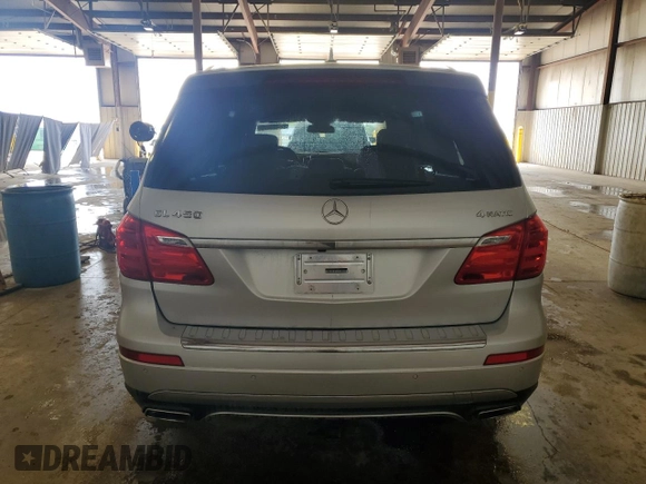 2013 Mercedes-Benz GL 450 z VIN 4JGDF7CE4DA115020, wystawiony jako Copart lot #54309625 z przebiegiem 166 123 mil mil oraz Szkoda całkowita • Salvage title. Historia ofert i sprzedaży dostępna na DreamBid. Obrazek 6.