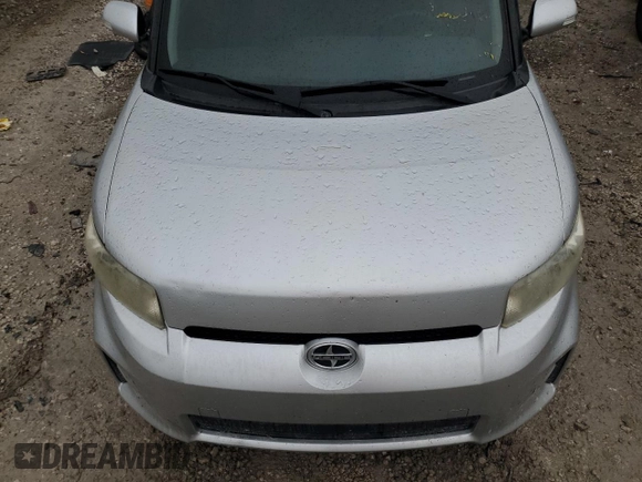 2012 Scion xB z VIN JTLZE4FE1C1144663, wystawiony jako Copart lot #59040605 z przebiegiem 199 468 mil mil oraz Tytuł czysty. Historia ofert i sprzedaży dostępna na DreamBid. Obrazek 12.