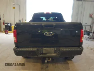 2015 Ford F-150 XLT z VIN 1FTFX1EFXFKE32133, wystawiony jako IAAI lot #42260644 z przebiegiem 136 724 mil mil oraz . Historia ofert i sprzedaży dostępna na DreamBid. Obrazek 16.