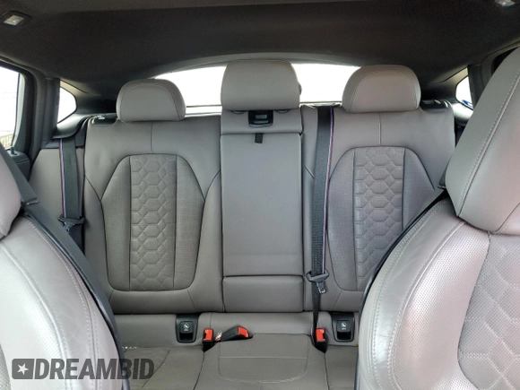 2020 BMW X4 M z VIN 5YMUJ0C08LLU67316, wystawiony jako Copart lot #53398995 z przebiegiem 34 470 mil mil oraz Szkody całkowita. Historia ofert i sprzedaży dostępna na DreamBid. Obrazek 10.