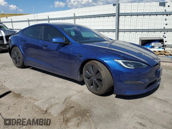 2023 Tesla Model S with VIN 5YJSA1E58PF531121, listed as a Copart auction lot 63683355 with Not provided miles and Salvage title. Bid and sale history available at DreamBid. Image 4.