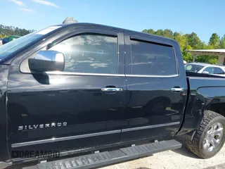 2015 Chevrolet Silverado 1500 LTZ with VIN 3GCUKSEC7FG145504, listed as a IAAI auction lot 41999825 with 206,560 mi miles and . Bid and sale history available at DreamBid. Image 14.