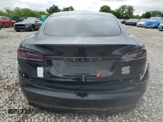 2023 Tesla Model S Plaid with VIN 5YJSA1E67PF511354, listed as a Copart auction lot 56648975 with 69,002 mi miles and Salvage title. Bid and sale history available at DreamBid. Image 6.