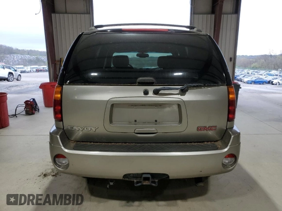 2003 GMC Envoy SLE z VIN 1GKDT13S432136642, wystawiony jako Copart lot #53467095 z przebiegiem 98 832 mil mil oraz Szkoda całkowita • Salvage title. Historia ofert i sprzedaży dostępna na DreamBid. Obrazek 6.