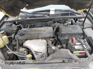 2002 Toyota Camry LE z VIN JTDBE32K720119418, wystawiony jako IAAI lot #42360721 z przebiegiem 235 678 mil mil oraz . Historia ofert i sprzedaży dostępna na DreamBid. Obrazek 10.