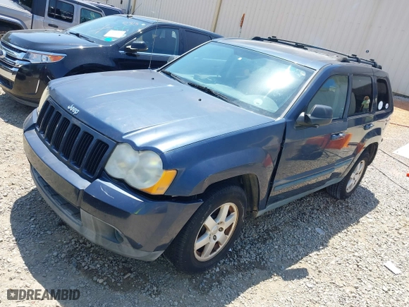 2009 Jeep Grand Cherokee Laredo with VIN 1J8GS48K79C539659, listed as a IAAI auction lot 42063431 with 1 mi miles. Bid and sale history available at carsss.com. Image 2.