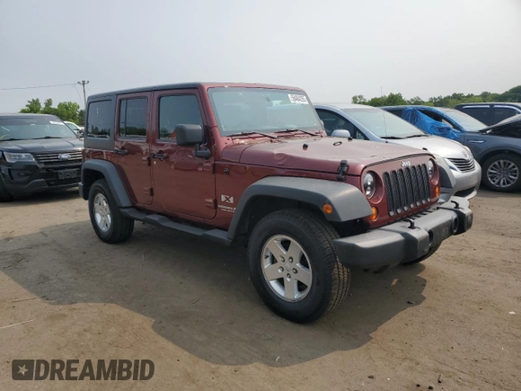 2007 Jeep Wrangler Unlimited X z VIN 1J4GA391X7L169728, wystawiony jako Copart lot #59484265 z przebiegiem 165 674 mil mil oraz Szkoda całkowita • Salvage title. Historia ofert i sprzedaży dostępna na DreamBid. Obrazek 4.