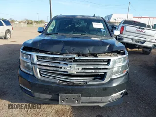 2016 Chevrolet Suburban LTZ with VIN 1GNSCJKC9GR212874, listed as a IAAI auction lot 41125926 with 82,714 mi miles and . Bid and sale history available at DreamBid. Image 12.