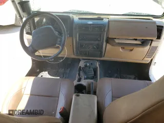 2001 Jeep Wrangler Sahara z VIN 1J4FA59S81P321490, wystawiony jako Copart lot #57320005 z przebiegiem 180 959 mil mil oraz Szkoda całkowita • Salvage title. Historia ofert i sprzedaży dostępna na DreamBid. Obrazek 8.