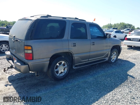 2005 GMC Yukon Denali z VIN 1GKEK63U35J229473, wystawiony jako IAAI lot #42266936 z przebiegiem 246 373 mil mil oraz . Historia ofert i sprzedaży dostępna na DreamBid. Obrazek 4.