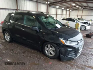 2020 Chevrolet Trax LT with VIN KL7CJLSB4LB092858, listed as a IAAI auction lot 41569395 with 59,086 mi miles. Bid and sale history available at carsss.com. Image 1.