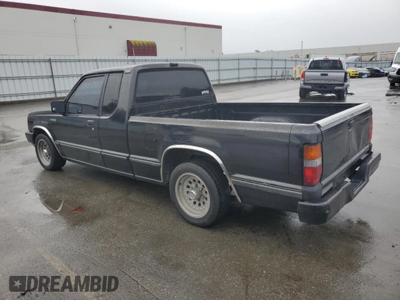 1991 Mitsubishi Mighty Max z VIN JA7FL25W7MP028365, wystawiony jako Copart lot #43964285 z przebiegiem 175 102 mil mil oraz Szkody całkowita. Historia ofert i sprzedaży dostępna na DreamBid. Obrazek 2.