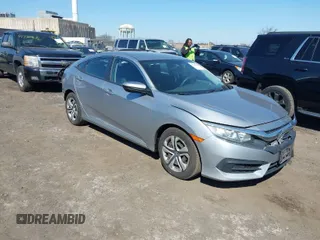 2016 Honda Civic Sedan LX with VIN 19XFC2F5XGE230467, listed as a IAAI auction lot 41768980 with 145,592 mi miles. Bid and sale history available at carsss.com. Image 1.