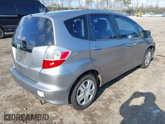 2009 Honda Fit with VIN JHMGE88279S064850, listed as a IAAI auction lot 41886951 with 185,580 mi miles. Bid and sale history available at carsss.com. Image 4.
