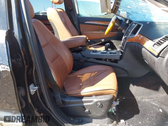 2013 Jeep Grand Cherokee Overland with VIN 1C4RJFCT2DC536899, listed as a IAAI auction lot 41853217 with 1 mi miles. Bid and sale history available at carsss.com. Image 5.