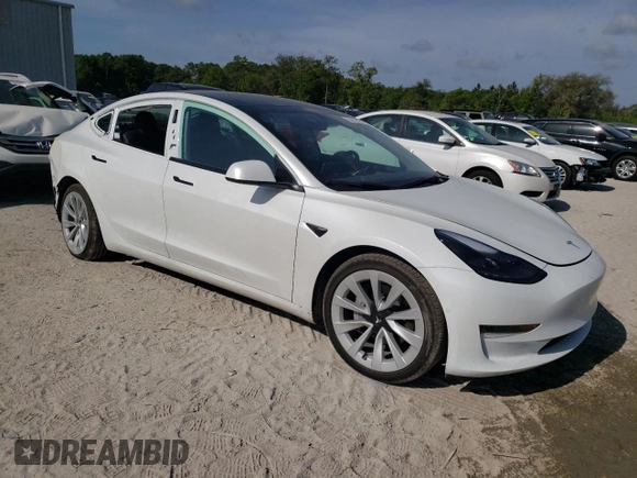 2022 Tesla Model 3 with VIN 5YJ3E1EA0NF320658, listed as a Copart auction lot 53317305 with 27,839 mi miles and Non Repairable. Bid and sale history available at carsss.com. Image 4.