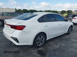 2021 Kia Forte FE with VIN 3KPF24AD7ME349327, listed as a IAAI auction lot 42166949 with 71,217 mi miles and . Bid and sale history available at DreamBid. Image 4.