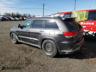 2014 Jeep Grand Cherokee Summit with VIN 1C4RJFJMXEC406768, listed as a Copart auction lot 54531045 with 154,957 mi miles and Clean Title. Bid and sale history available at carsss.com. Image 2.