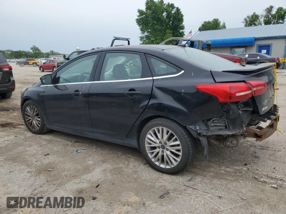 2017 Ford Focus Titanium with VIN 1FADP3J23HL218867, listed as a Copart auction lot 55417305 with 98,710 mi miles and Salvage title. Bid and sale history available at DreamBid. Image 2.