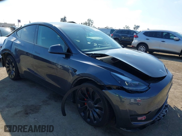 2023 Tesla Model Y Performance with VIN 7SAYGDEF5PF823122, listed as a IAAI auction lot 41546480 with 12,943 mi miles and . Bid and sale history available at DreamBid. Image 1.