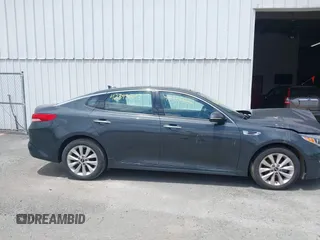 2016 Kia Optima EX z VIN 5XXGU4L34GG010877, wystawiony jako IAAI lot #42398843 z przebiegiem 157 102 mil mil oraz . Historia ofert i sprzedaży dostępna na DreamBid. Obrazek 13.