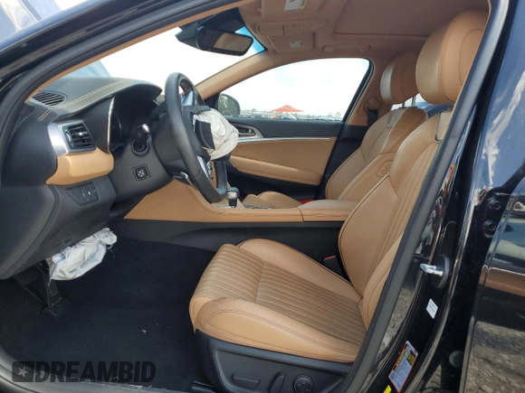2022 Genesis G70 2.0T with VIN KMTG34TA2NU103729, listed as a Copart auction lot 65336264 with 51,705 mi miles and Salvage Title. Bid and sale history available at carsss.com. Image 7.