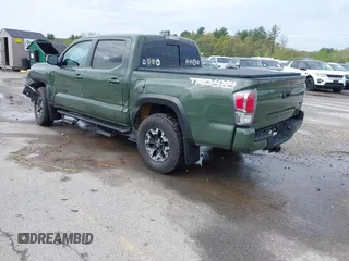 2021 Toyota Tacoma SR with VIN 3TMCZ5AN5MM380286, listed as a IAAI auction lot 42165523 with 58,965 mi miles and . Bid and sale history available at DreamBid. Image 3.