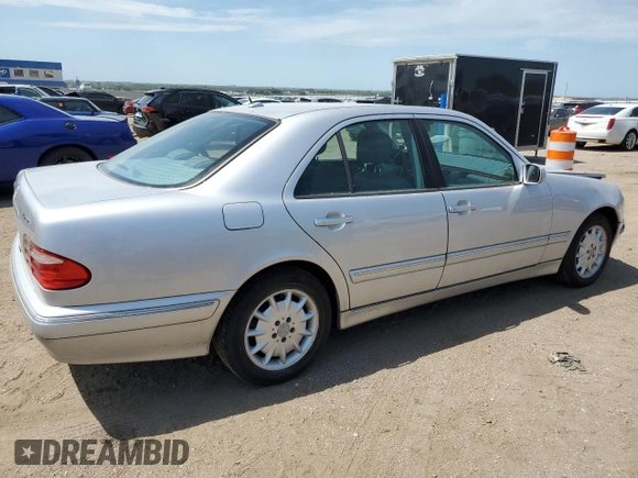 2002 Mercedes-Benz E-Class with VIN WDBJF82J92X065591, listed as a Copart auction lot 65841964 with 155,195 mi miles and Salvage Title. Bid and sale history available at carsss.com. Image 3.