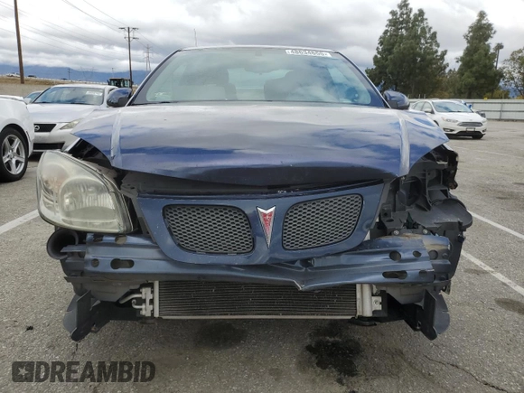 2009 Pontiac G5 with VIN 1G2AS18H997204531, listed as a Copart auction lot 48634655 with 73,936 mi miles and Salvage Title. Bid and sale history available at DreamBid. Image 5.