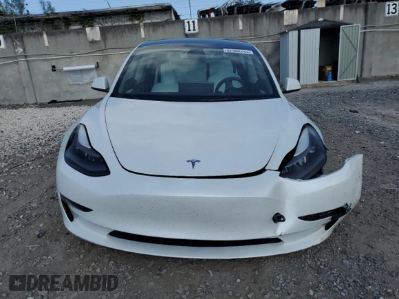2023 Tesla Model 3 z VIN 5YJ3E1EAXPF422956, wystawiony jako Copart lot #52500285 z przebiegiem 24 082 mil mil oraz Nie do naprawy • Non repairable. Historia ofert i sprzedaży dostępna na DreamBid. Obrazek 5.