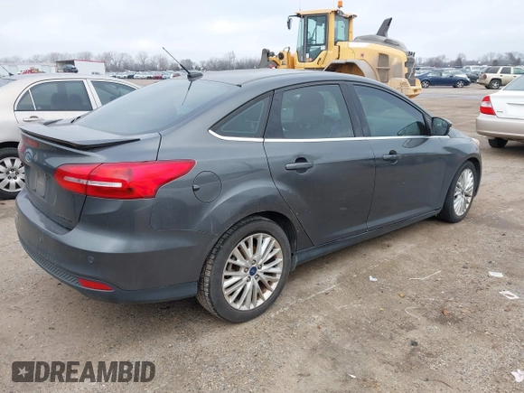2018 Ford Focus Titanium with VIN 1FADP3J29JL232911, listed as a IAAI auction lot 41524078 with 90,764 mi miles and . Bid and sale history available at DreamBid. Image 4.