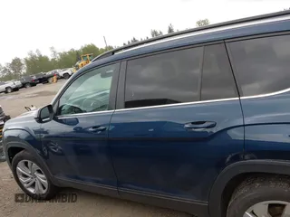 2021 Volkswagen Atlas SE z VIN 1V2WR2CA7MC568779, wystawiony jako IAAI lot #42132709 z przebiegiem 51 205 mil mil oraz . Historia ofert i sprzedaży dostępna na DreamBid. Obrazek 13.