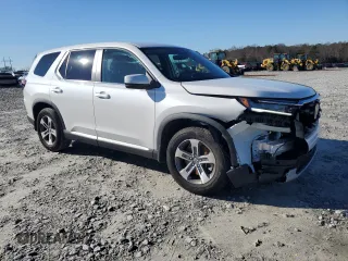2023 Honda Pilot EX-L 8 Passenger with VIN 5FNYG2H49PB011916, listed as a Copart auction lot 87109874 with 12,461 mi miles and Salvage Title. Bid and sale history available at carsss.com. Image 4.