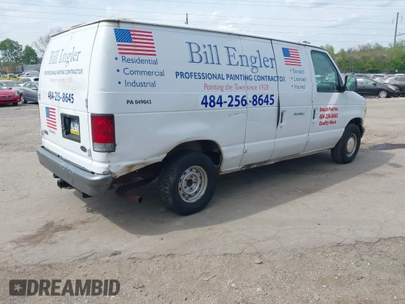 2000 Ford Econoline Cargo with VIN 1FTRE14W1YHB19251, listed as a IAAI auction lot 42114841 with 164,139 mi miles. Bid and sale history available at carsss.com. Image 4.