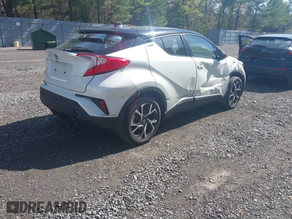2019 Toyota C-HR XLE with VIN NMTKHMBX5KR097682, listed as a IAAI auction lot 42145372 with 11,003 mi miles and . Bid and sale history available at DreamBid. Image 4.