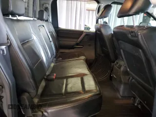 2011 Nissan Titan Pro-4X with VIN 1N6AA0EC5BN307980, listed as a Copart auction lot 42000295 with 168,335 mi miles and Salvage title. Bid and sale history available at DreamBid. Image 10.
