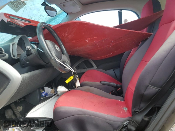 2009 Smart fortwo Pure with VIN WMEEJ31X79K249060, listed as a Copart auction lot 56927145 with Not provided miles and Salvage title. Bid and sale history available at DreamBid. Image 7.