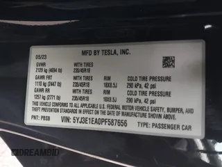 2023 Tesla Model 3 with VIN 5YJ3E1EA0PF587656, listed as a IAAI auction lot 41489586 with 12,844 mi miles and . Bid and sale history available at DreamBid. Image 9.