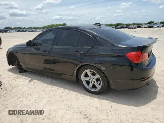 2014 BMW 3 Series 328i with VIN WBA3A5G52ENP30251, listed as a Copart auction lot 82926134 with 106,666 mi miles and Salvage title. Bid and sale history available at DreamBid. Image 2.