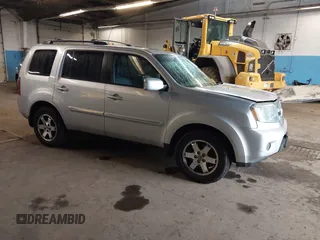 2009 Honda Pilot Touring with VIN 5FNYF48929B010331, listed as a IAAI auction lot 41965094 with 142,490 mi miles and . Bid and sale history available at carsss.com. Image 1.