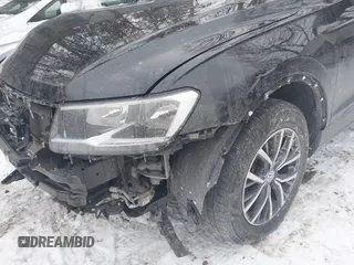 2019 Volkswagen Tiguan SE z VIN 3VV2B7AX5KM092909, wystawiony jako IAAI lot #41645271 z przebiegiem 59 460 mil mil oraz . Historia ofert i sprzedaży dostępna na DreamBid. Obrazek 6.