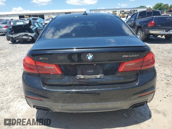 2019 BMW 5 Series M550i xDrive with VIN WBAJB9C53KB289356, listed as a Copart auction lot 57814535 with 60,454 mi miles and Clean title. Bid and sale history available at DreamBid. Image 6.