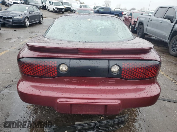 2001 Pontiac Firebird Firebird z VIN 2G2FS22K112122739, wystawiony jako Copart lot #86128074 z przebiegiem 271 969 mil mil oraz Czysty tytuł • Clean title. Historia ofert i sprzedaży dostępna na DreamBid. Obrazek 6.