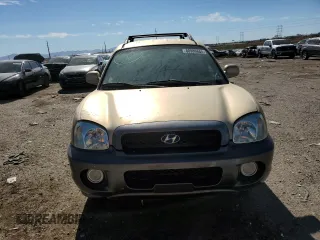 2002 Hyundai Santa Fe GLS with VIN KM8SC13DX2U288055, listed as a Copart auction lot 80986684 with 153,582 mi miles and Clean Title. Bid and sale history available at carsss.com. Image 5.