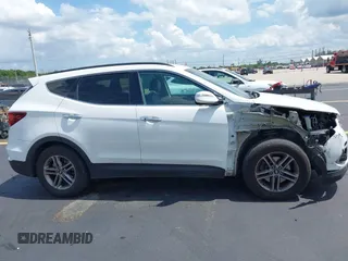 2017 Hyundai Santa Fe 2.4L z VIN 5NMZU3LB9HH034850, wystawiony jako IAAI lot #42342054 z przebiegiem 192 154 mil mil oraz . Historia ofert i sprzedaży dostępna na DreamBid. Obrazek 14.
