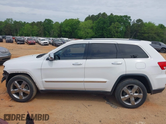 2013 Jeep Grand Cherokee Overland with VIN 1C4RJECGXDC621227, listed as a IAAI auction lot 42098042 with 194,232 mi miles and . Bid and sale history available at DreamBid. Image 14.
