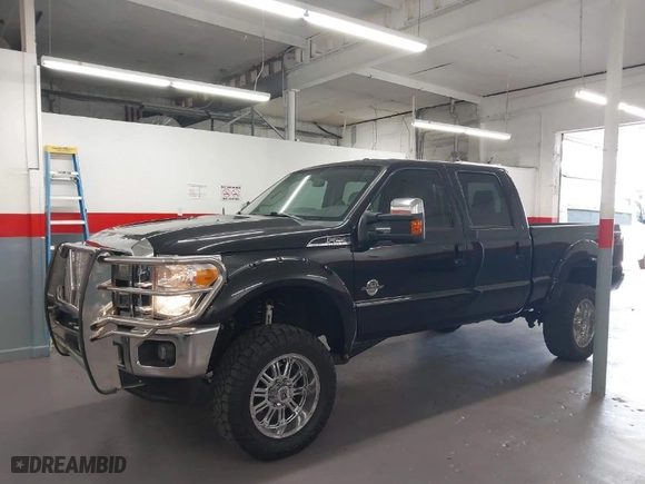 2015 Ford Super Duty F-250 SRW Lariat with VIN 1FT7W2BT1FED13599, listed as a IAAI auction lot 41987618 with 174,728 mi miles. Bid and sale history available at carsss.com. Image 12.