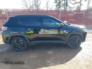 2019 Jeep Compass Altitude z VIN 3C4NJCBB1KT612989, wystawiony jako IAAI lot #41330536 z przebiegiem 145 404 mil mil oraz . Historia ofert i sprzedaży dostępna na DreamBid. Obrazek 13.