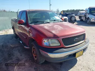 2000 Ford F-150 XL with VIN 1FTZX1725YNA94343, listed as a IAAI auction lot 41659358 with 295,337 mi miles. Bid and sale history available at carsss.com. Image 14.